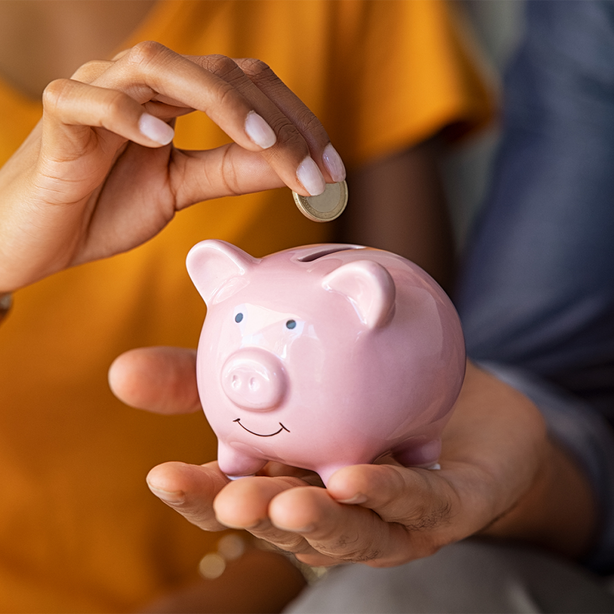Happy woman reviewing savings